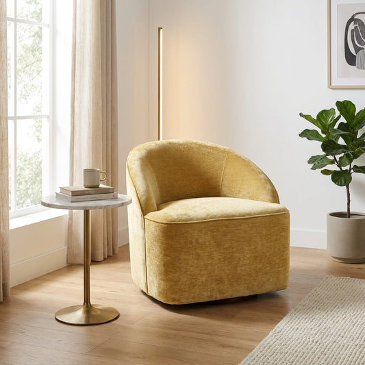 Comfy, golden velvet armchair with a rounded backrest.