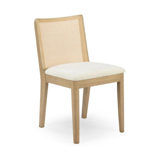 Wooden chair with woven backrest and cushioned white seat.