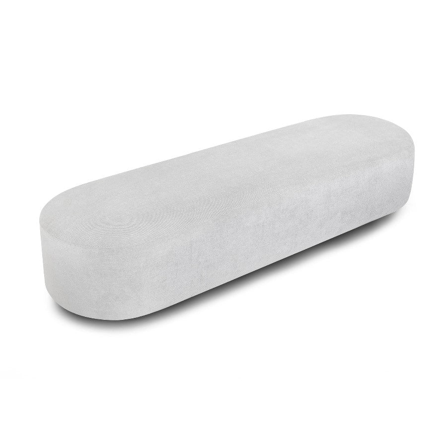 Long, rounded, light gray bench stool on a white background.