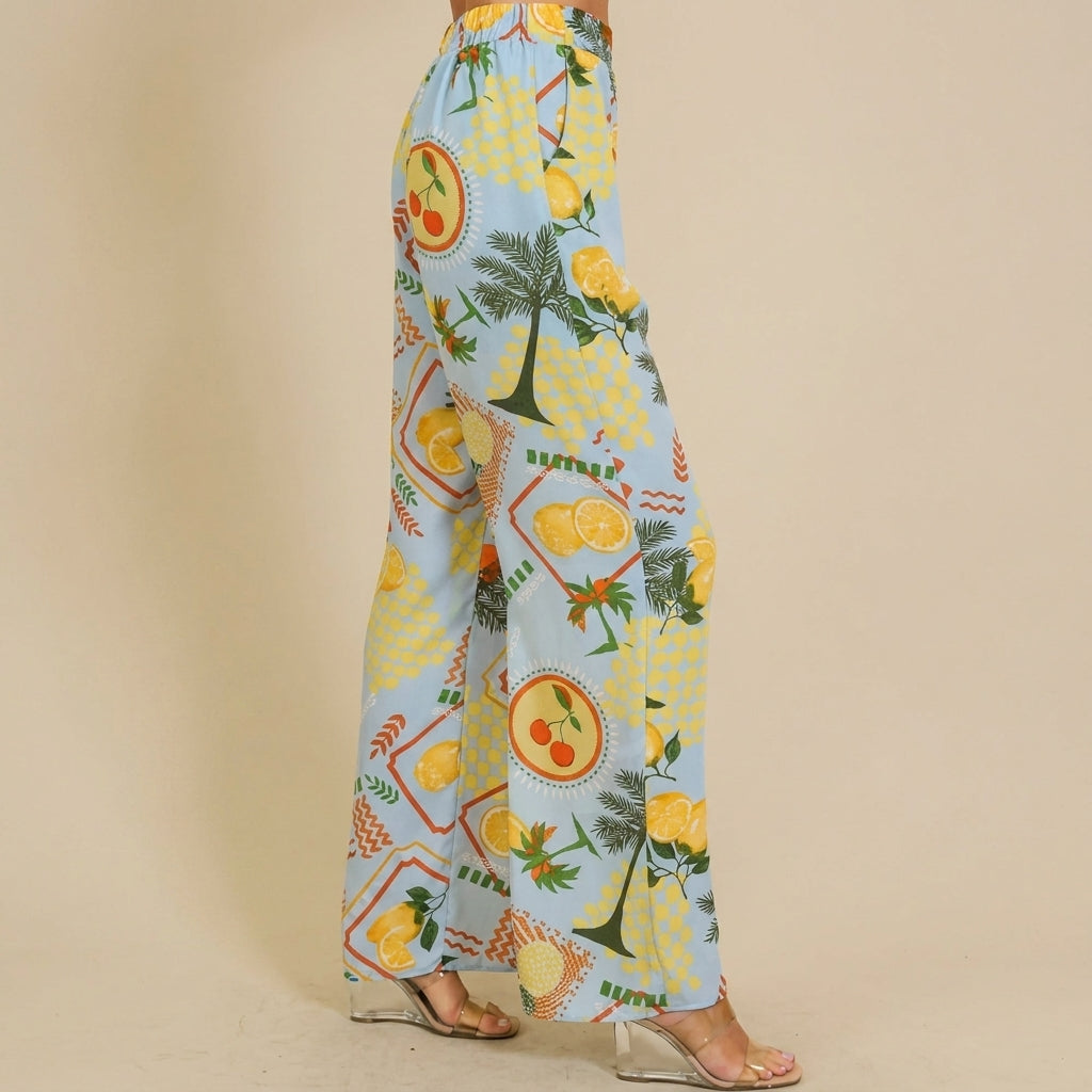 Colorful, fruit-themed wide-leg pants with transparent heels.