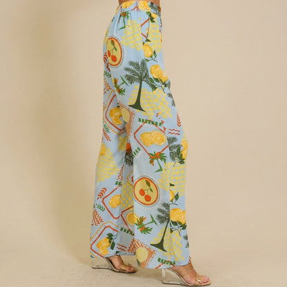 Colorful, fruit-themed wide-leg pants with transparent heels.