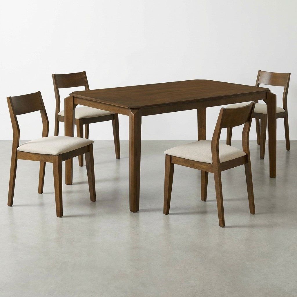 Wooden table with four matching chairs on a gray floor.