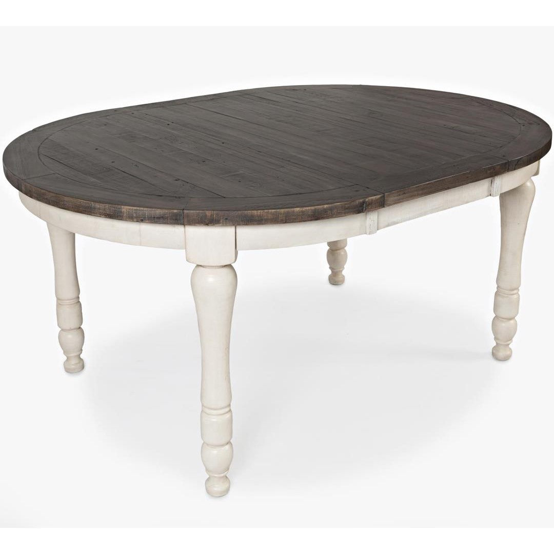 Oval wooden table with turned white legs and dark top.