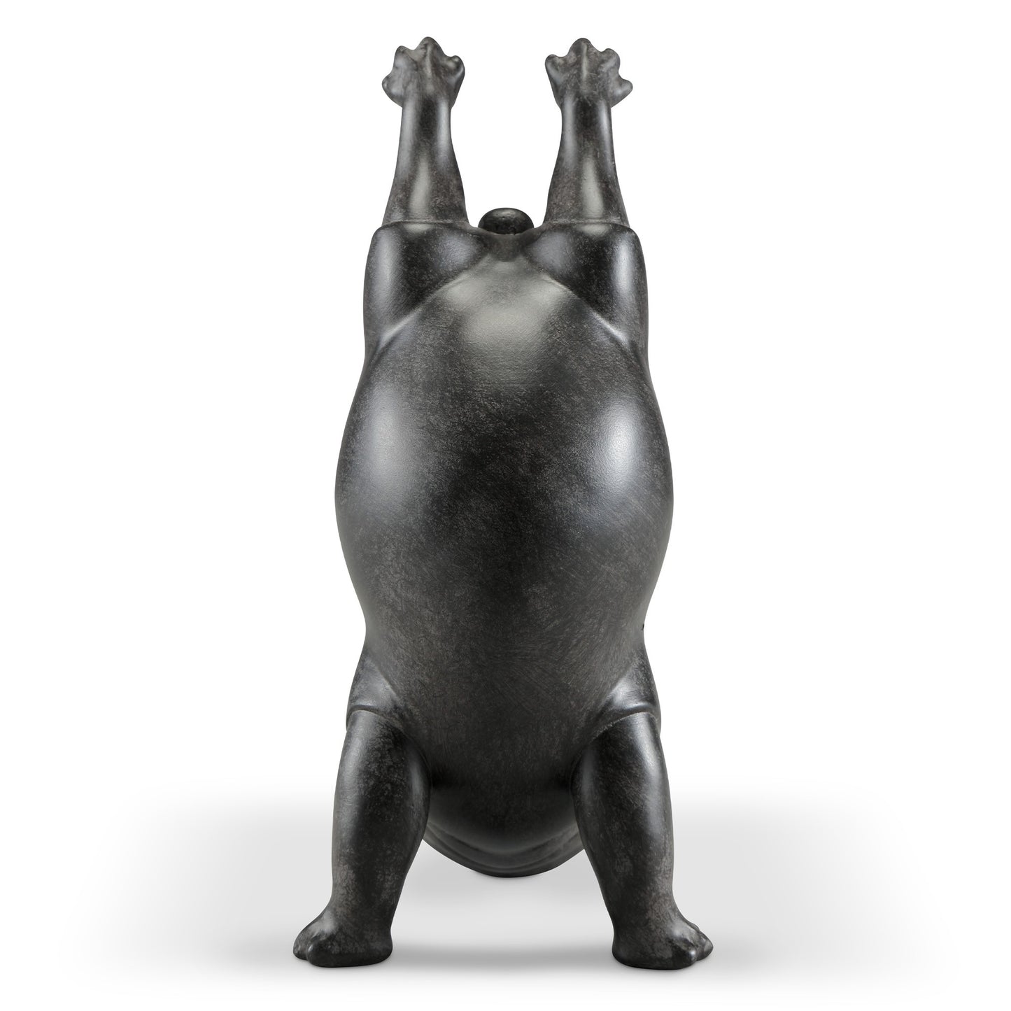 Abstract sculpture of a bear standing on its hind legs.