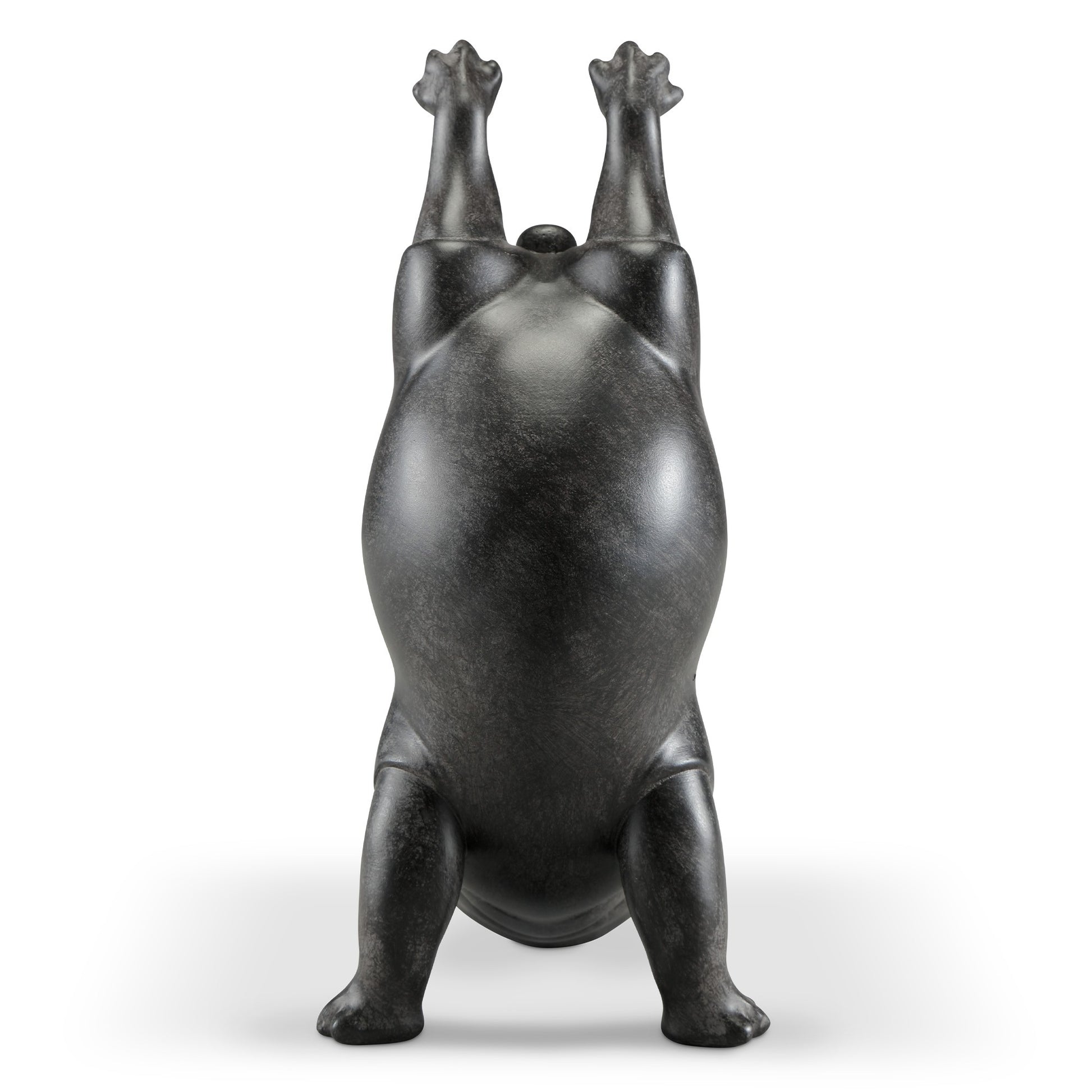 Abstract sculpture of a bear standing on its hind legs.