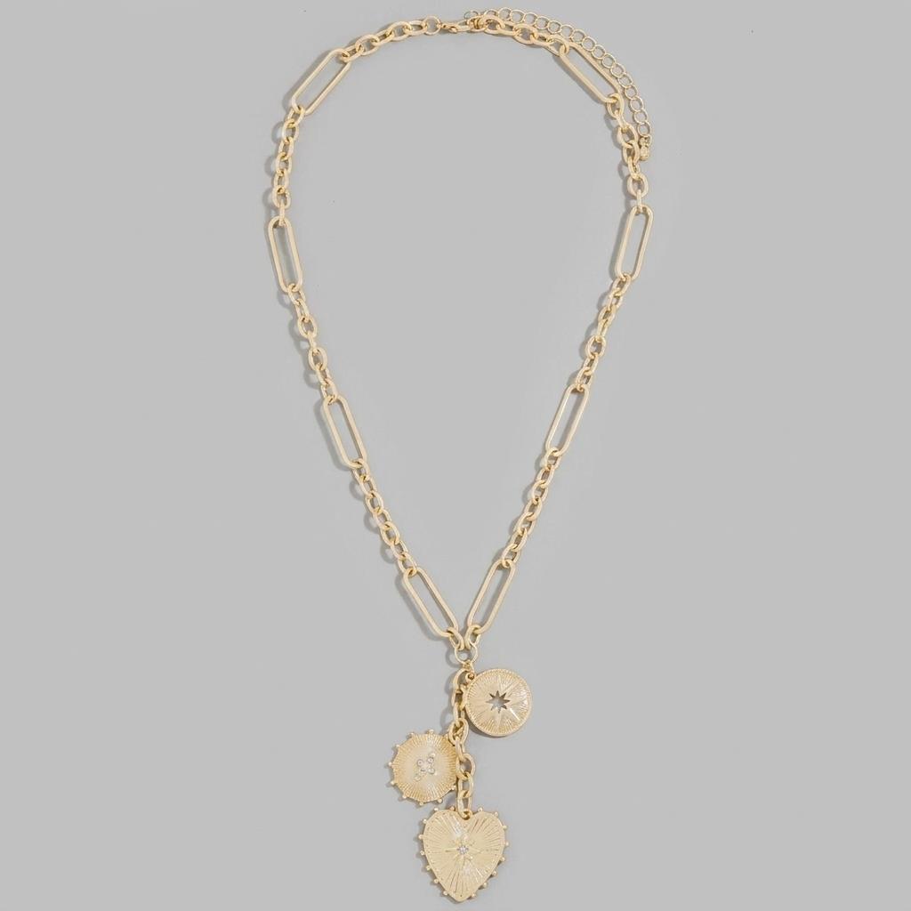 Gold chain necklace with three decorative charms.