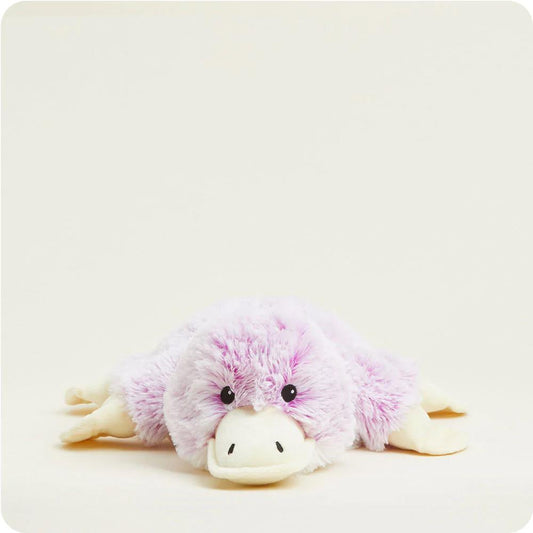 Fluffy purple platypus plush toy on a white background.