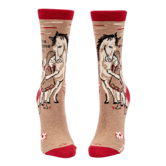 Beige socks with red accents, featuring a girl hugging a horse.