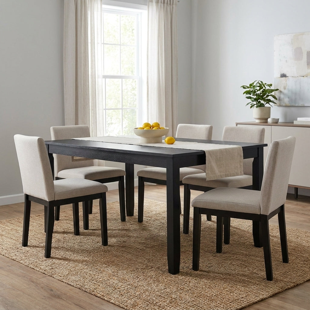 Black rectangular table with four legs on a white background.