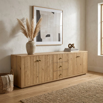 Wooden sideboard with cabinets and drawers, minimal design.