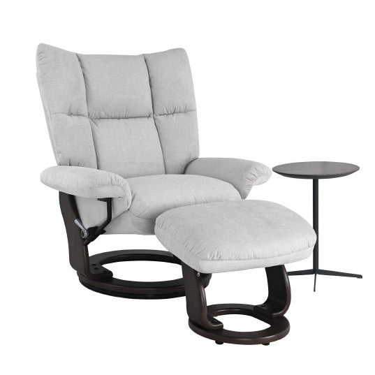 Comfy armchair with ottoman and small side table.