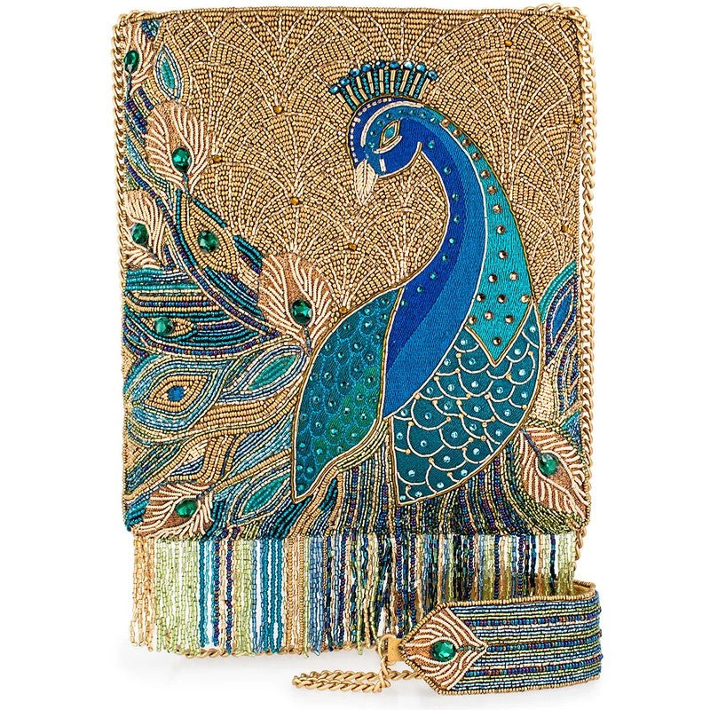 Elegant clutch with intricate peacock design in blue and gold embroidery.