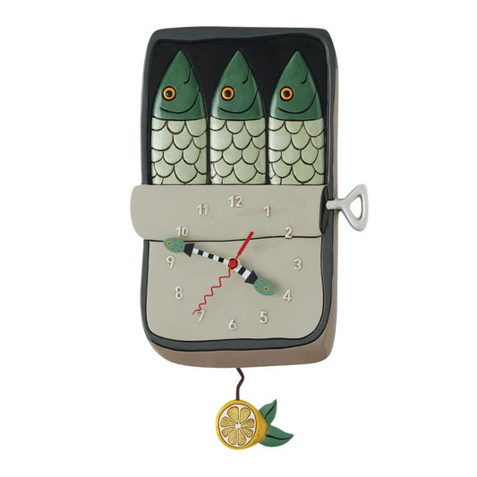 Quirky fish-themed clock with a lemon pendulum.