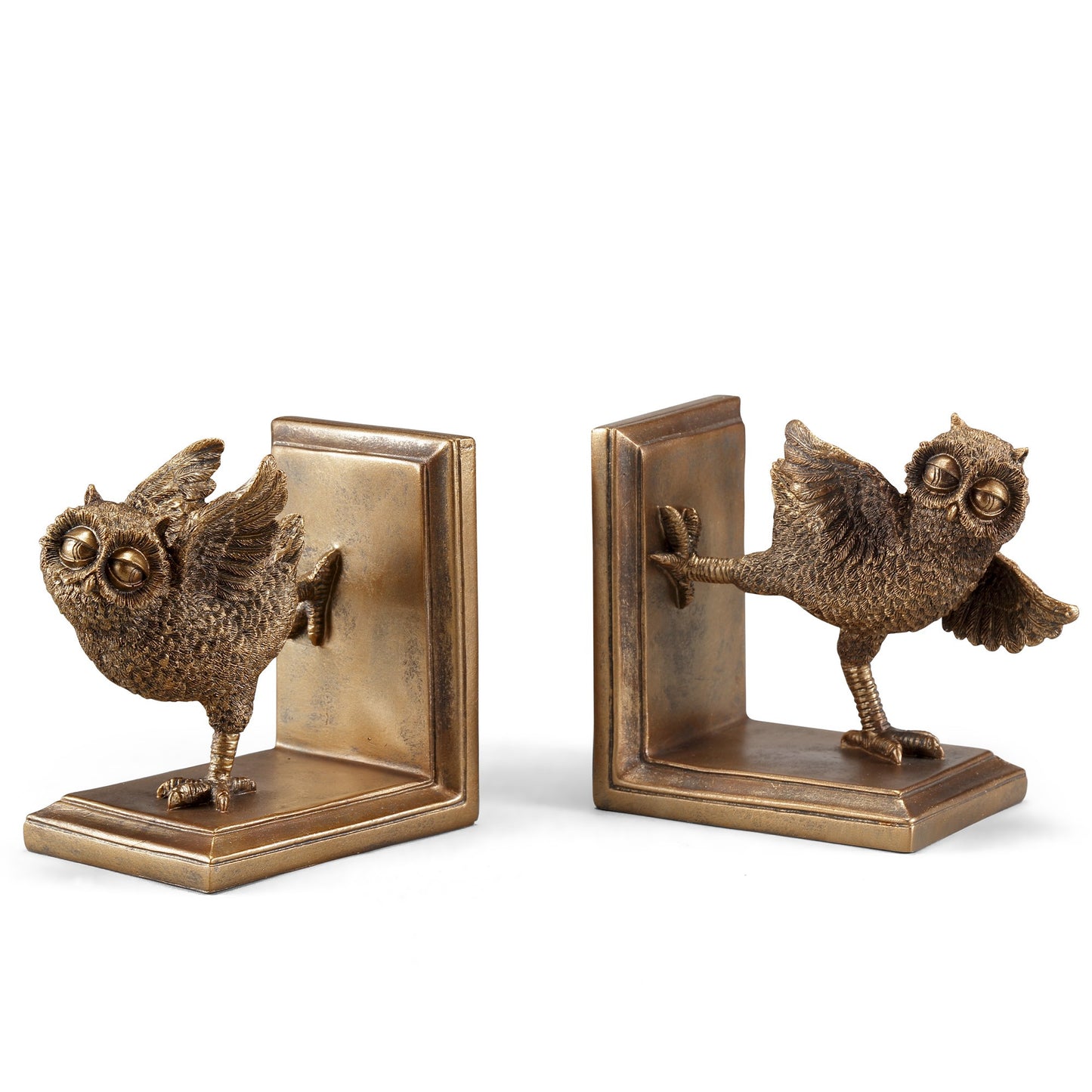 Bronze owl bookends with playful poses.