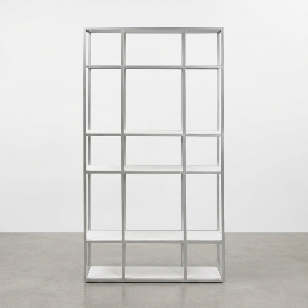 White, minimalist shelving unit with five rows and multiple compartments.