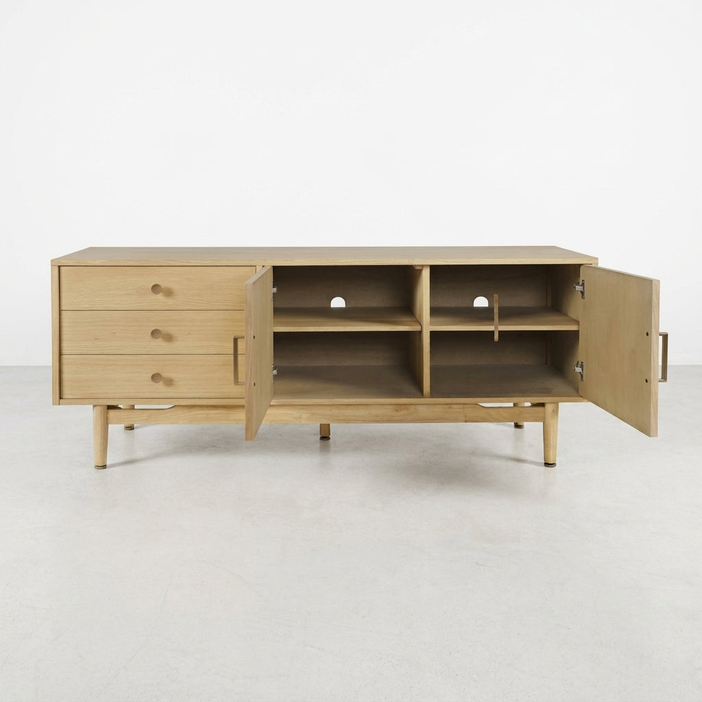 Light wood TV stand with open doors, drawers, and shelves; minimalist design.