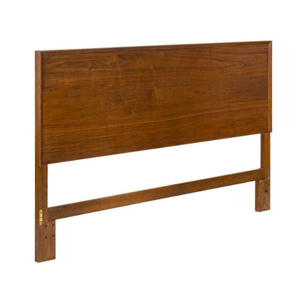 Wooden headboard with a minimalist design.