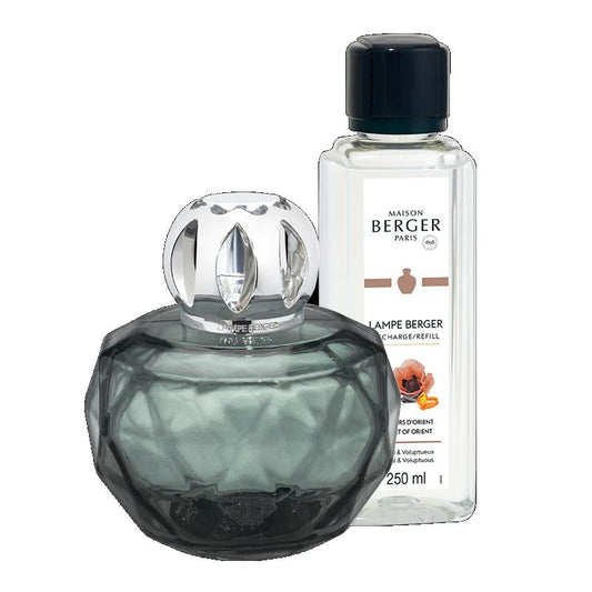 Elegant fragrance lamp with a refill bottle.