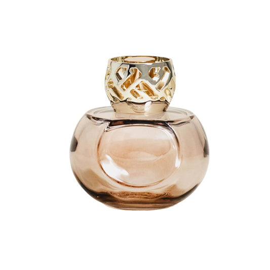 Elegant glass bottle with ornate gold cap.