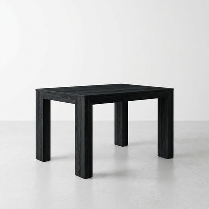 Black wooden table on a light floor background.