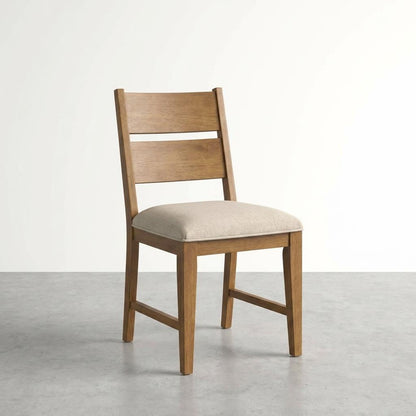 Wooden chair with beige cushion, simple and elegant design.