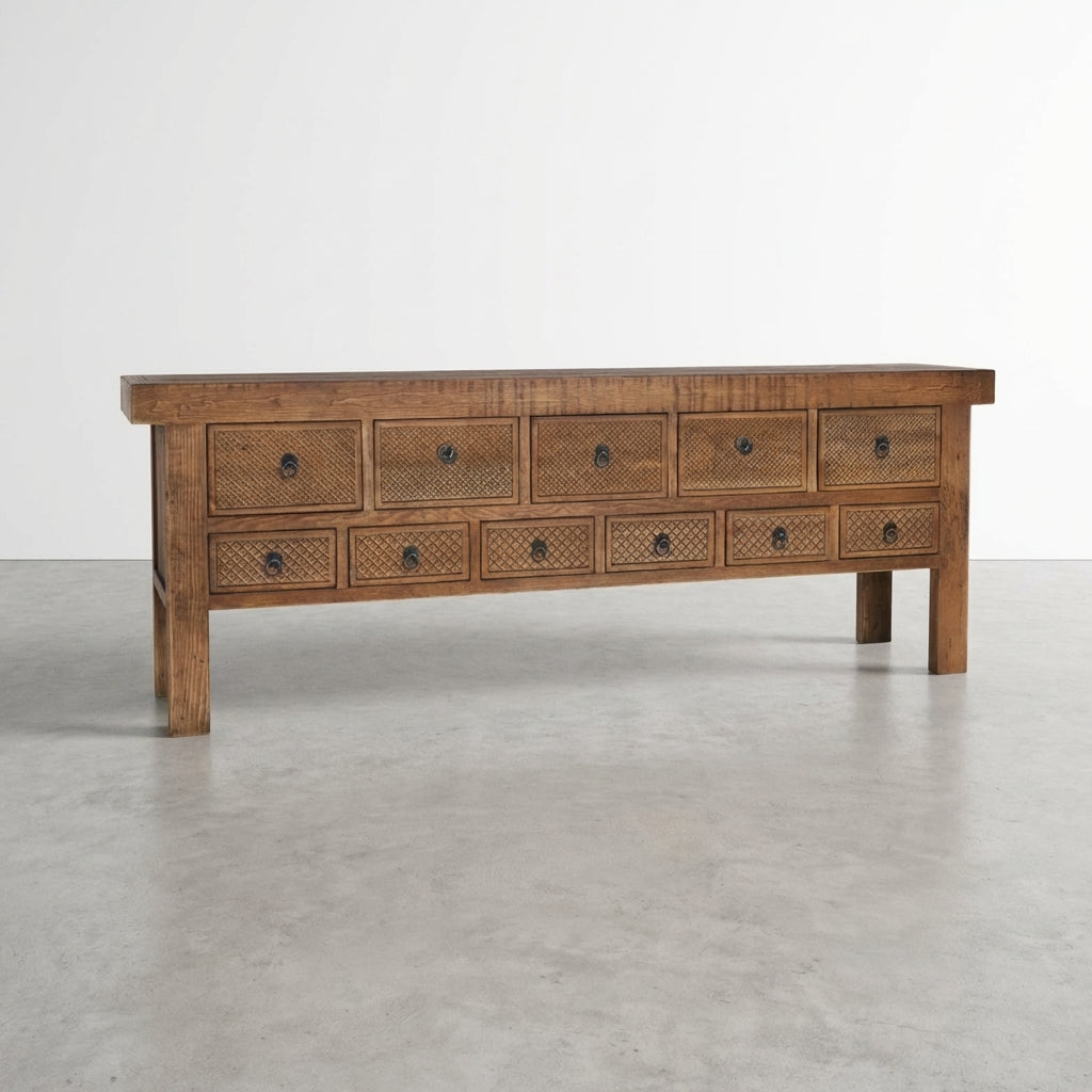 Wooden drawer console with multiple drawers in a rustic style.