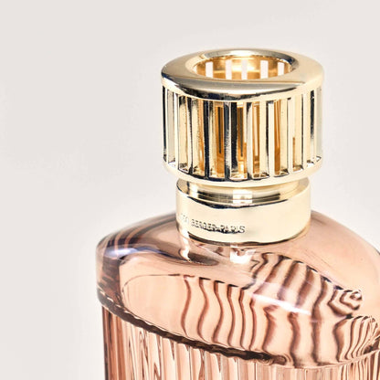 Elegant glass bottle with a gold cap.