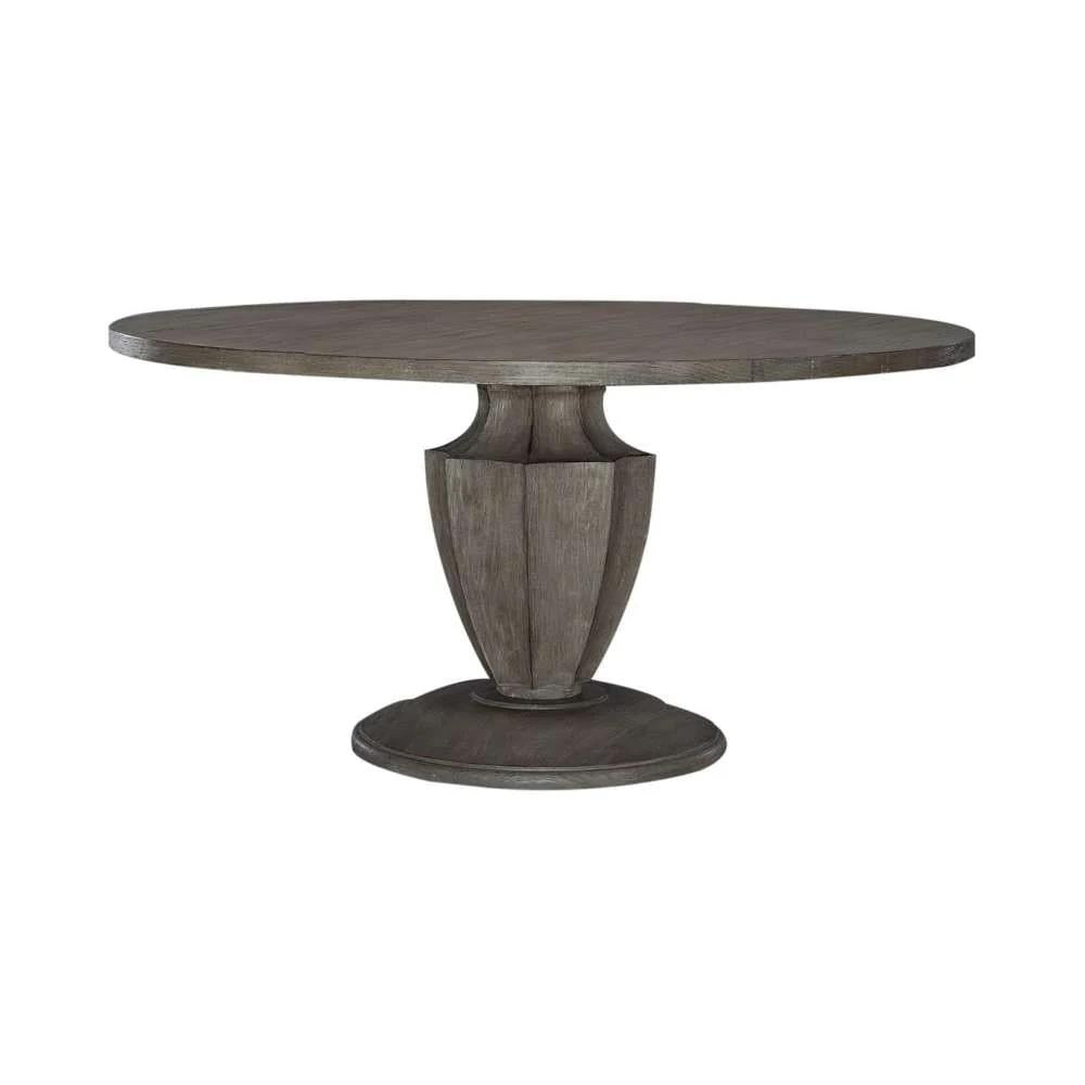 Round wooden pedestal table with a rustic finish.