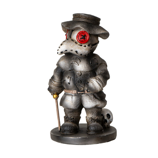 Plague doctor figurine with red eyes, cane, and skull detail.
