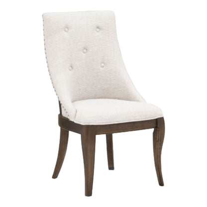 Elegant chair with a cream cushioned back and wooden legs.