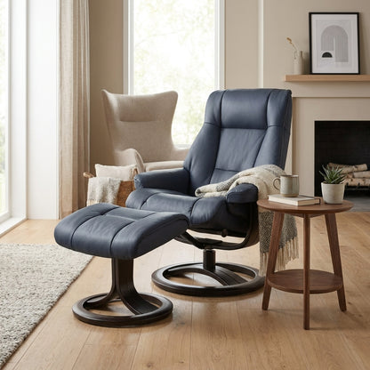 Blue recliner chair with matching footrest.