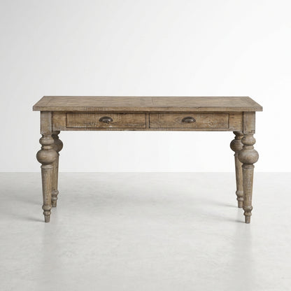 Rustic wooden table with two drawers and turned legs.