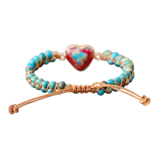 Beaded bracelet with blue stones and a heart centerpiece.
