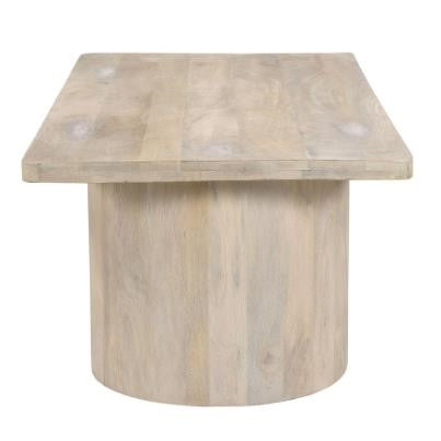 Wooden table with a cylindrical base and rectangular top.