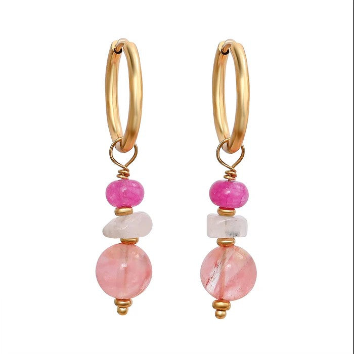 Gold hoop earrings with pink and clear gemstone beads.