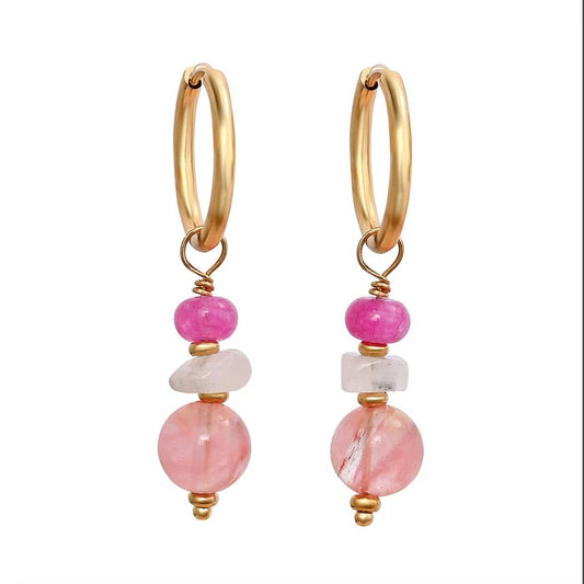 Gold hoop earrings with pink and clear gemstone beads.