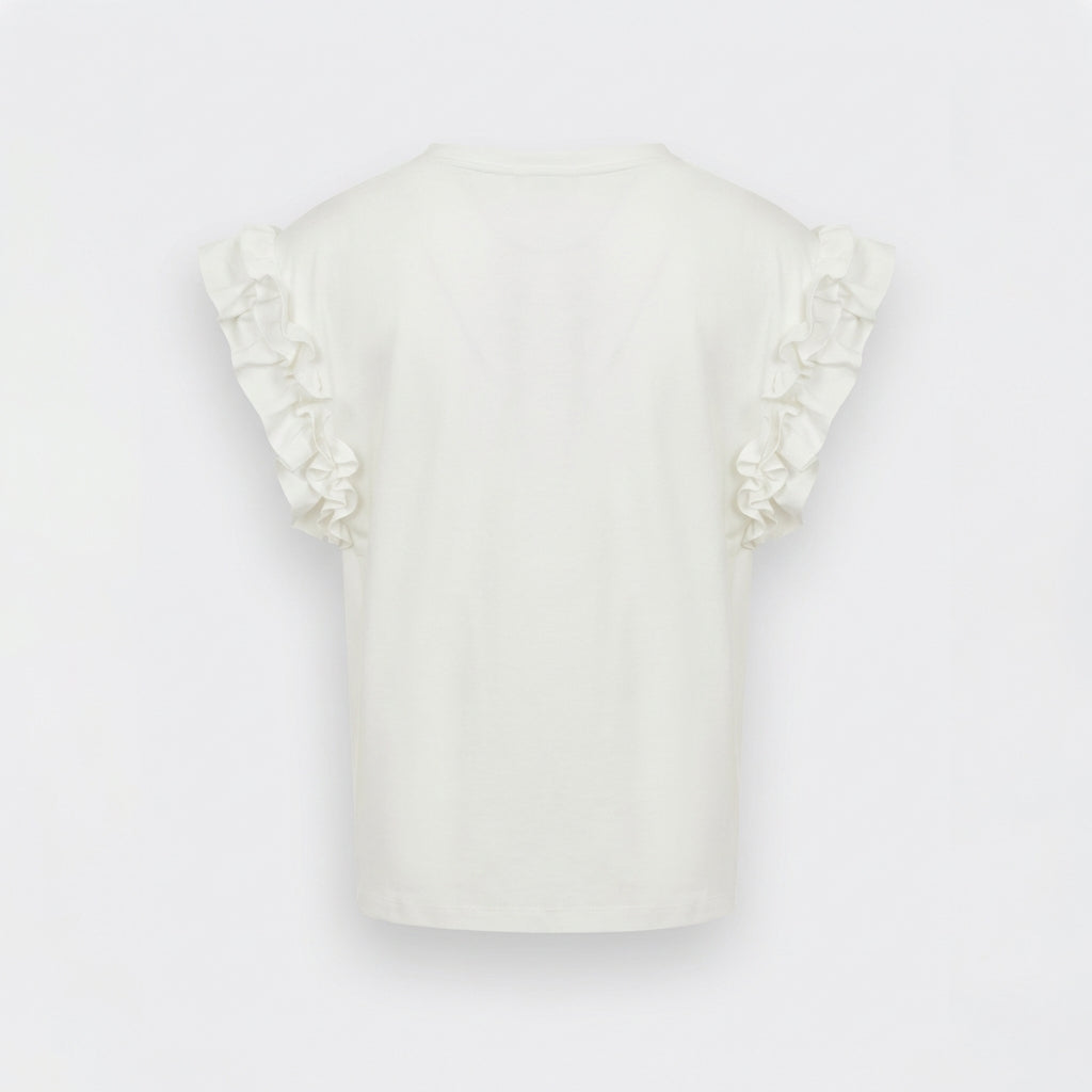 White ruffled sleeves on a plain shirt.
