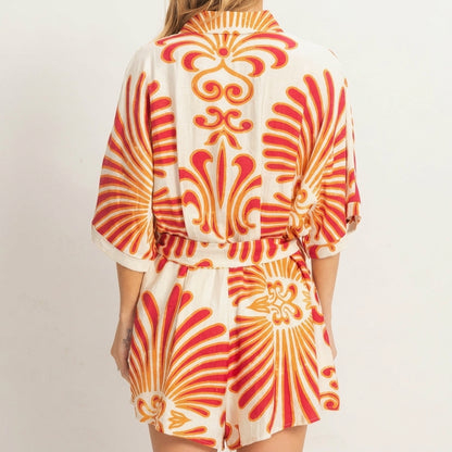 Back view of a vibrant, patterned summer outfit.