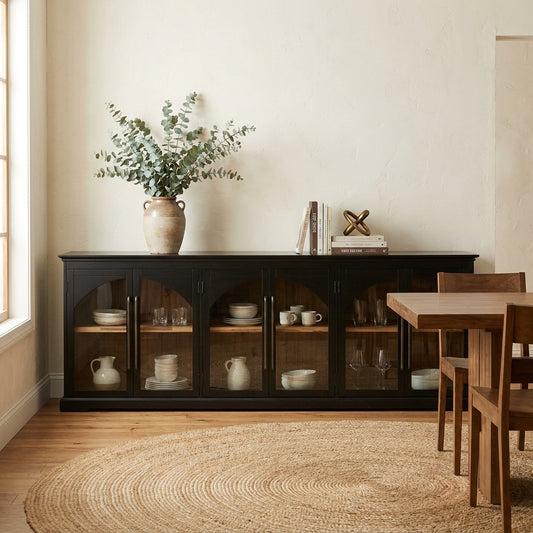 Black wooden cabinet with glass-paneled doors and shelves.