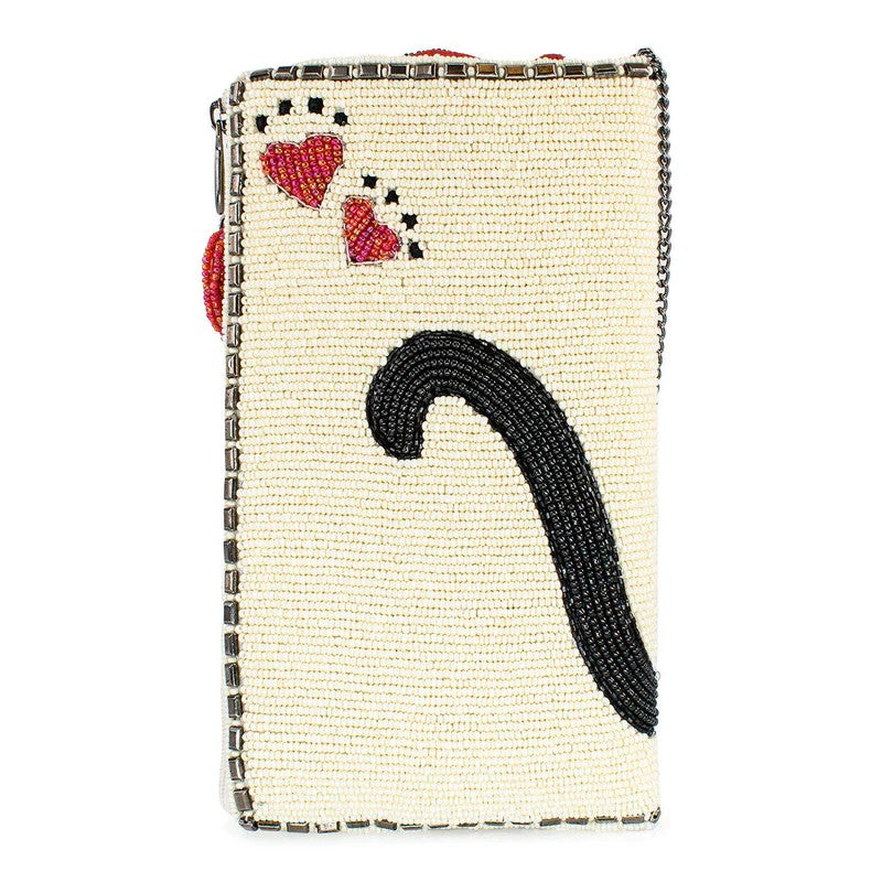 Beaded clutch with red hearts and black spiral design.