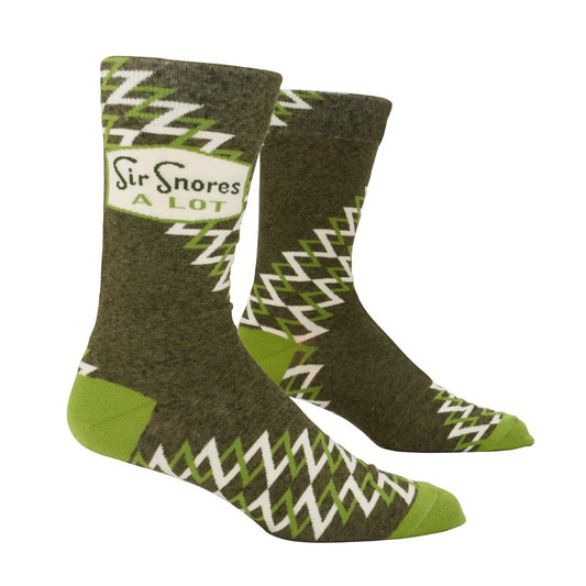 Green patterned socks with "Sir Snores A Lot" text.