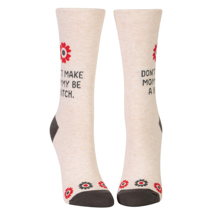 Beige socks with red flowers and cheeky message "Don't make mommy be a b****."