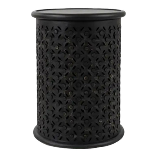 Black cylindrical container with a floral cut-out design.