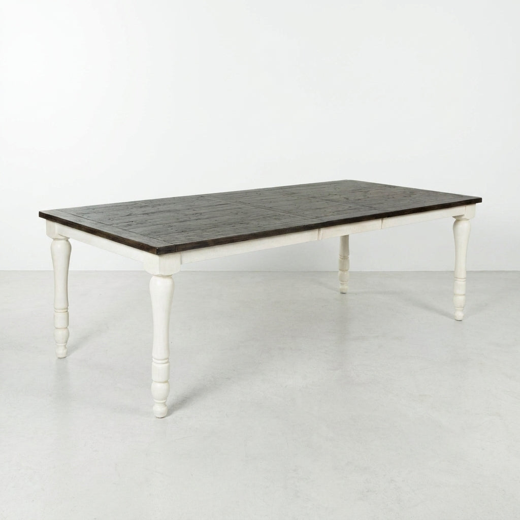 Rustic wood dining table with white legs.