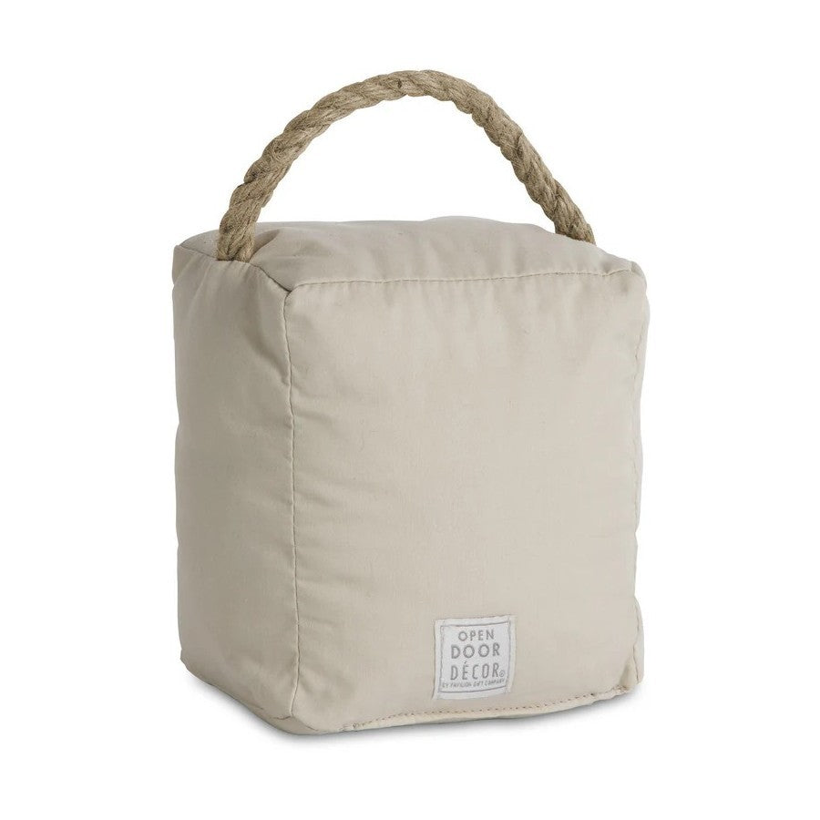 Beige fabric doorstop with rope handle.