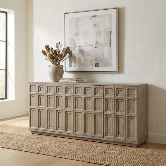 Wooden sideboard with intricate rectangular panel design.