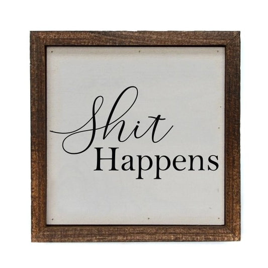 Wooden-framed sign with "Shit Happens" text.