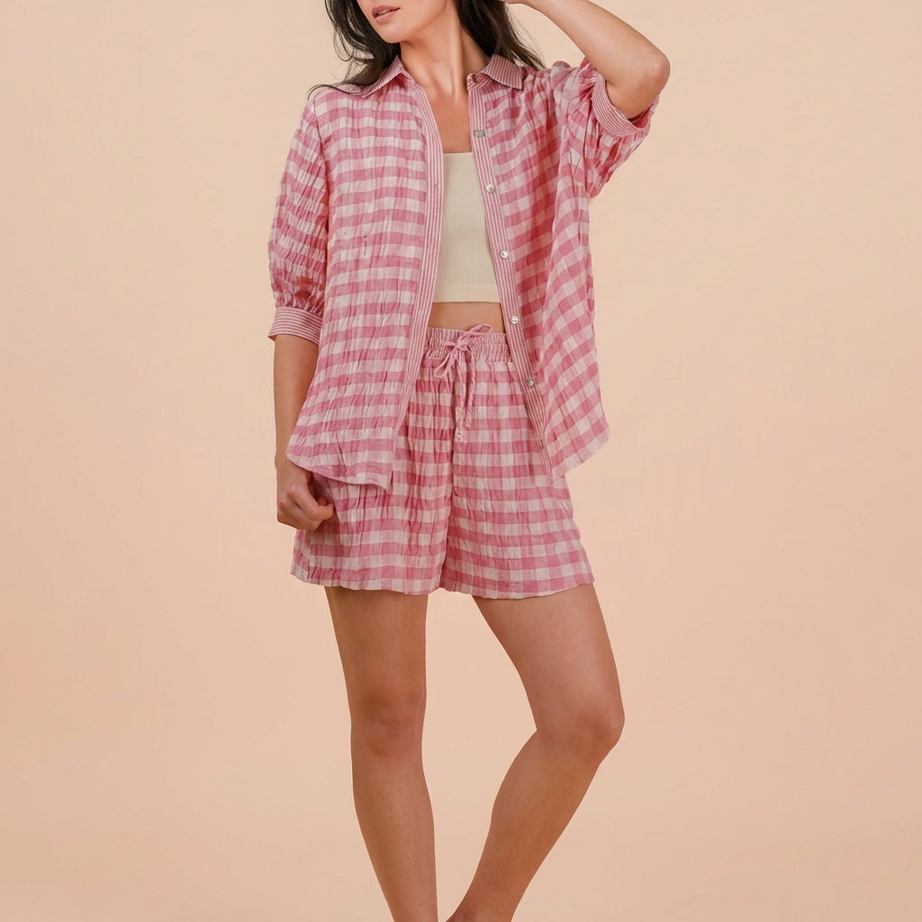 Pink and white checkered outfit with a cropped top and shorts.