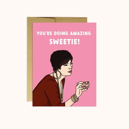 Illustrated card: "You're doing amazing sweetie!" with a stylish figure holding a camera.