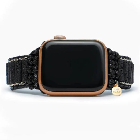 Smartwatch with a black braided band and rose-gold case.